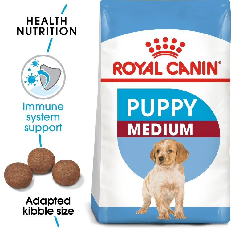 Royal Canin Puppy Medium dog food package with text highlighting health nutrition benefits.