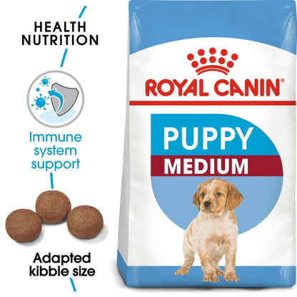 Royal Canin Puppy Medium dog food package with text highlighting health nutrition benefits.