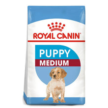 Royal Canin Puppy Medium dog food package on a white background